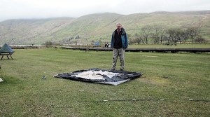 Putting a tent up at the Cwellyn Arms Campsite