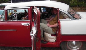 Me in an old American car in Cuba