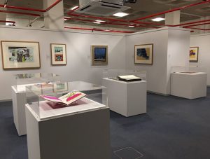 Inside an art gallery showing a display of Pop art.