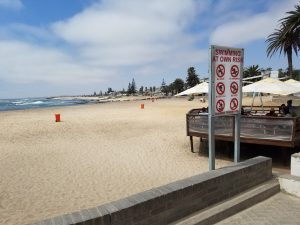 Swakopmund beach with a confusing sign